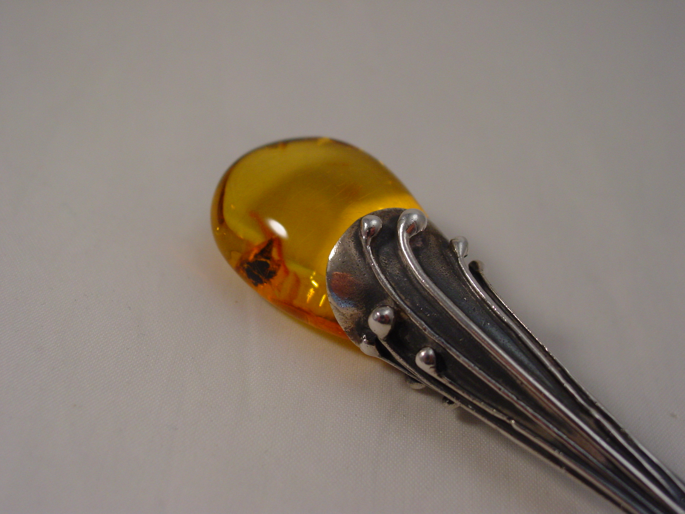 Briefopener met Barnsteen